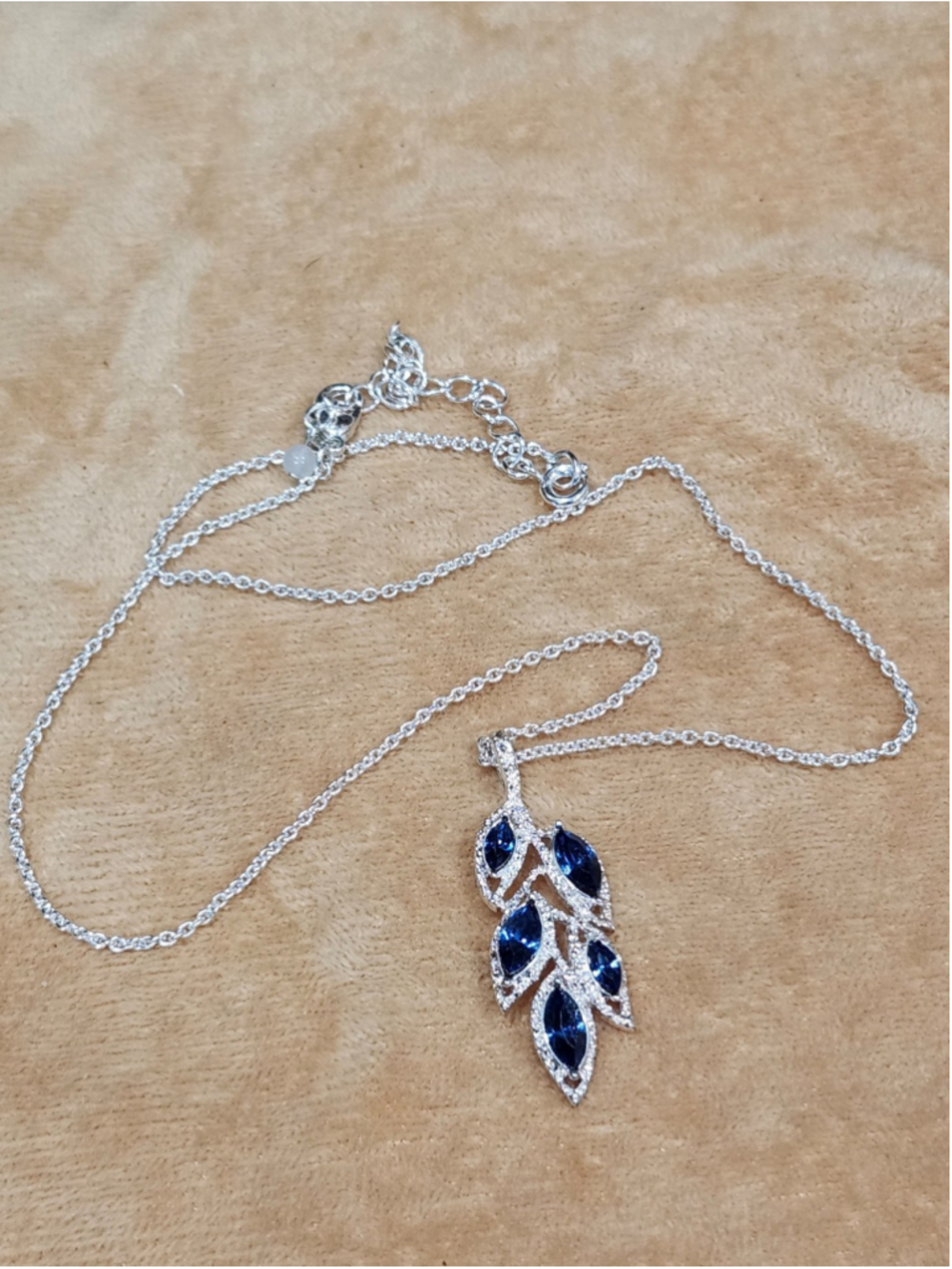 Silver Leaf Pendant Necklace with Blue Crystals